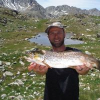 Fishing high-altitude trout lakes by helicopter in the Pyrenees